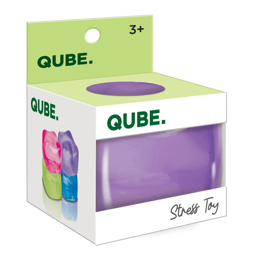 QUBE Stress Toy in its original retail packaging, featuring a purple cylindrical toy visible through a clear window on a white box with a light green header card.