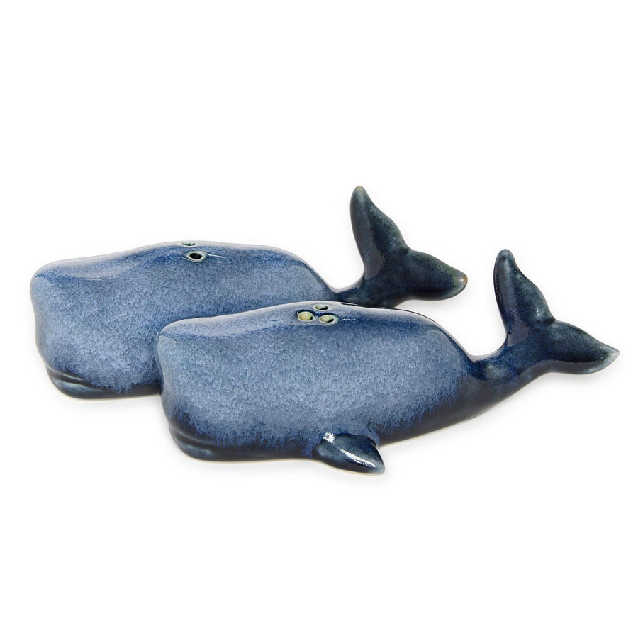 Two blue whale-shaped ceramic salt and pepper shakers on a white background