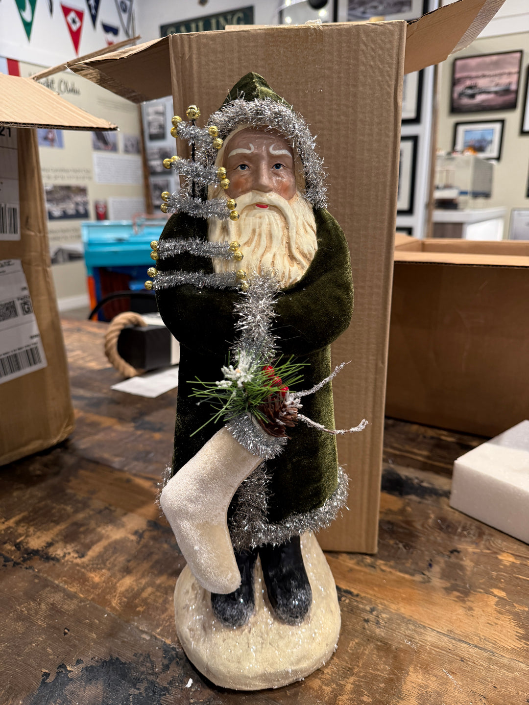 Santa with Dk. Green Coat holding Tree and Stocking 16.75"