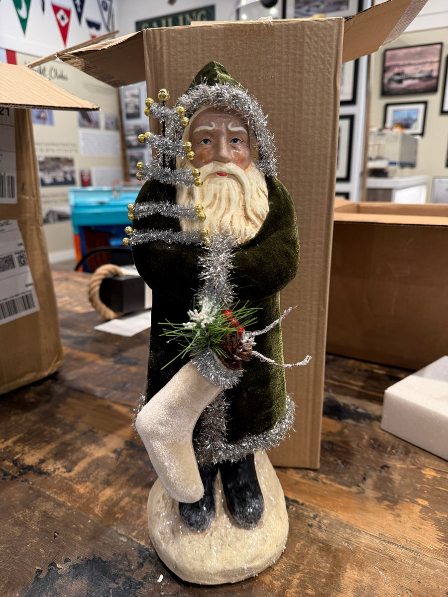 Santa with Dk. Green Coat holding Tree and Stocking 16.75"